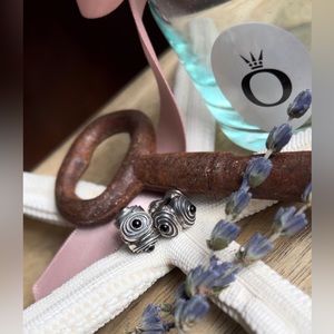 Pair of Retired Pandora Onyx Hypnotize Clip